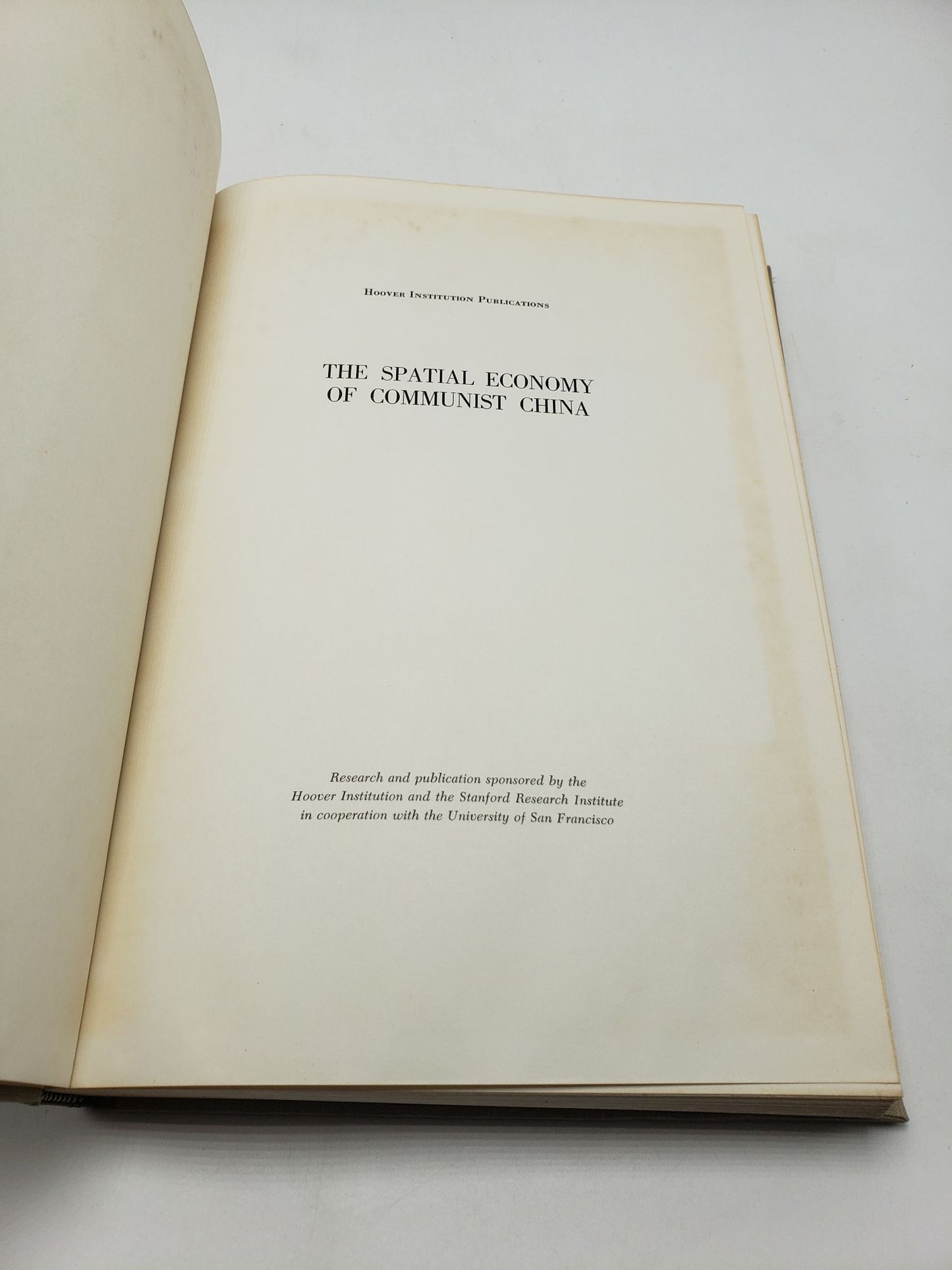 The Spatial Economy of Communist China: A Study of Industrial Location and Transportation